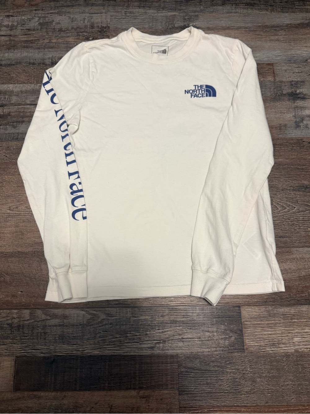The North Face Women’s Long-Sleeve Logo Shirt in White with Blue Print